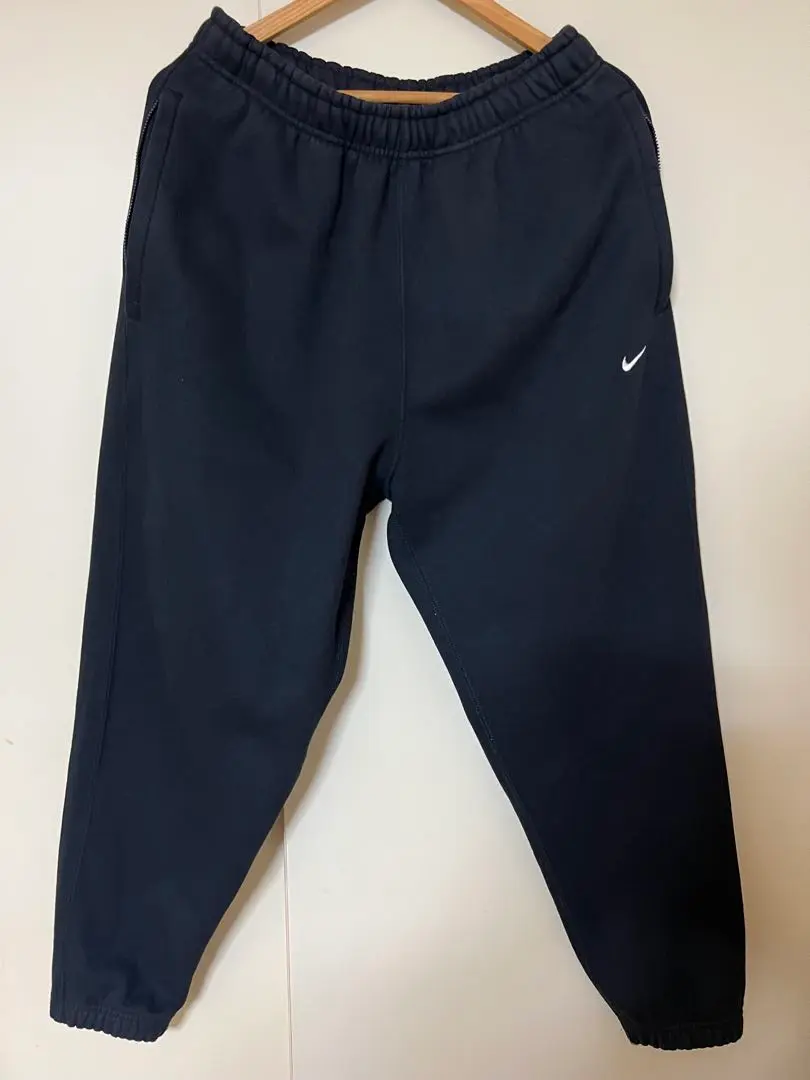 NIKE ソロスウッシュ ナイロンパンツ NIKE AS M NK SOLO SWSH FLC CF PANT BLACK/WHITE（ナイキ ソロ