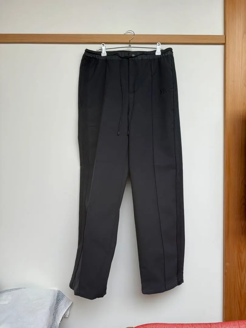 NIKE sacai YUSUKE HANAI 運動褲 的縮圖