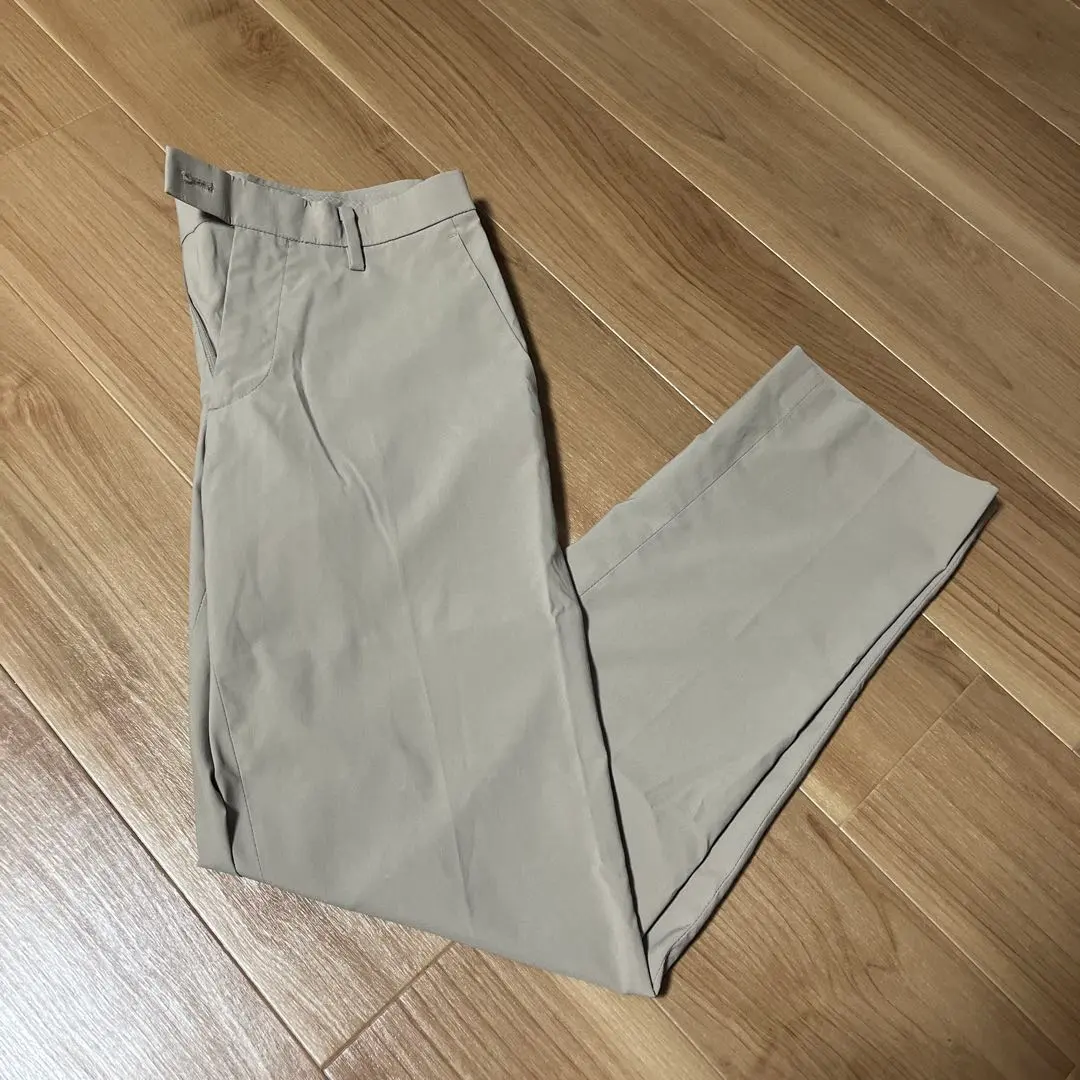 Thumbnail of UNIQLO Beige Pleated Slacks