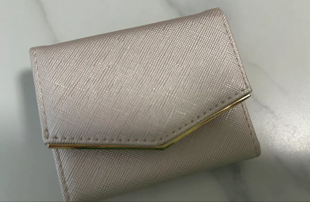 Thumbnail of Pink gold small folding wallet with card pockets