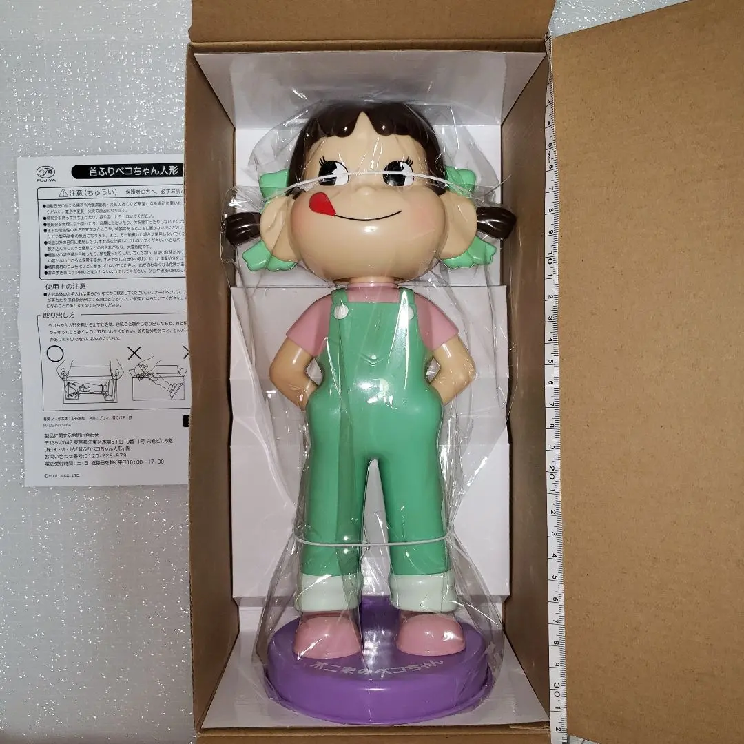 不二家　ペコちゃん　首振り人形　緑台 不二家 ペコちゃん人形 首振り人形 緑台 匿名配送 - メルカリ