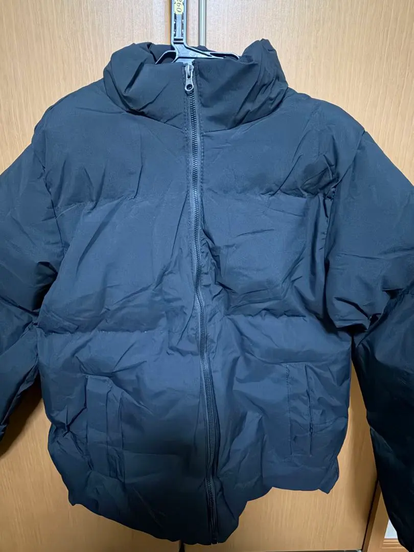 Thumbnail of Black down jacket