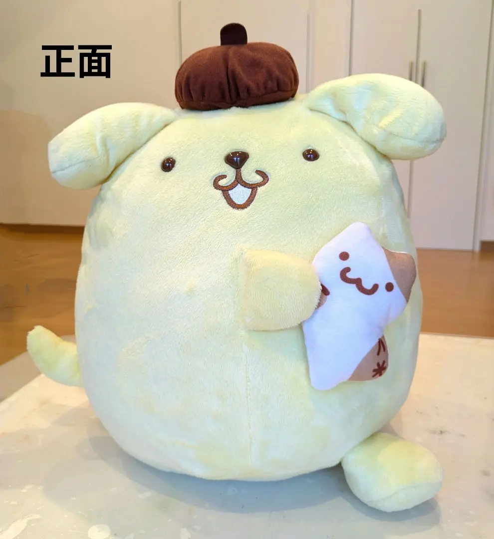 Thumbnail of Pom Pom Purin BIG Plush - Side-Facing, Holding Muffin - SANRIO