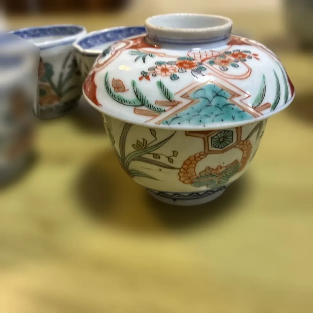 Thumbnail of Red-painted lidded nimono bowl (1 lid), and a set of 4 rice bowls
