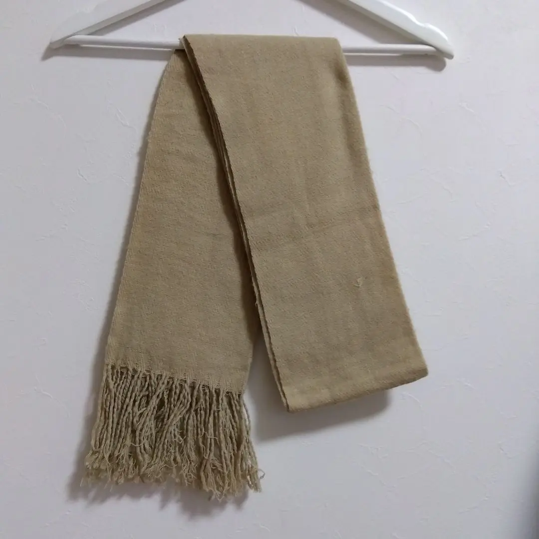 Thumbnail of Beige fringed muffler