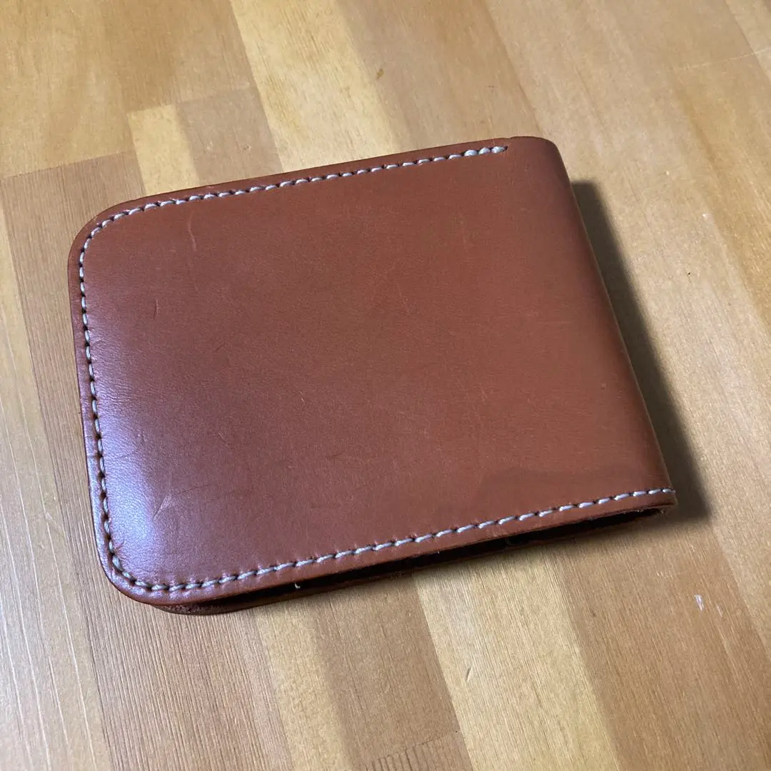 Thumbnail of Price reduced! ↓ Brown leather bi-fold wallet