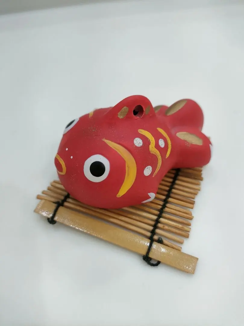 Thumbnail of Price reduced! Goldfish figurines, 8-piece set of clay bells.