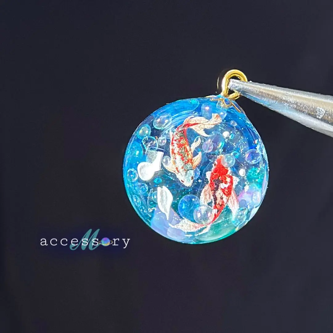 Thumbnail of 25mm sphere. Gracefully swimming carp, floating petals, sphere, pendant, keychain, necklace