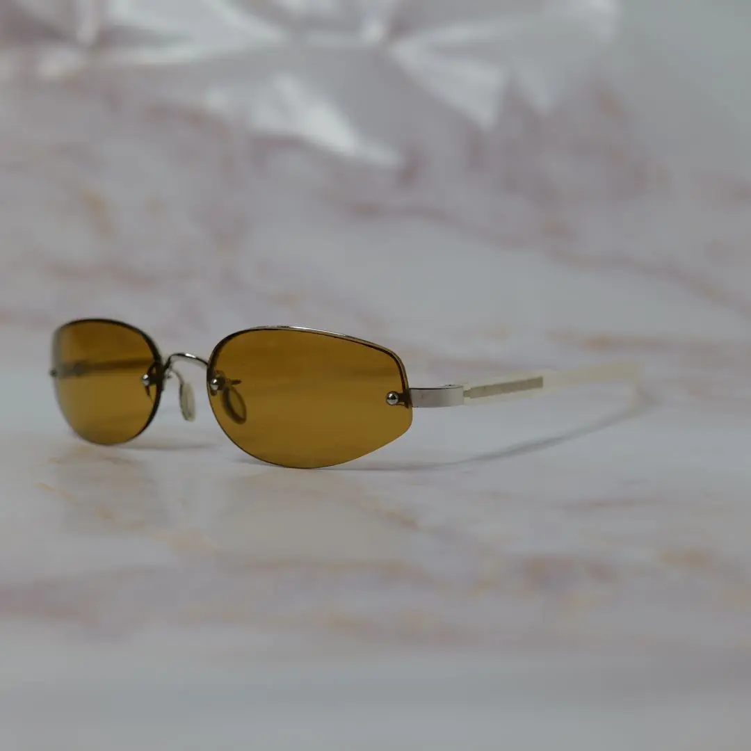 PRADA プラダ サングラス アンダーリム リムレス ゴールド 日本製 Prada（プラダ）リムレス サングラス | SmartBuyGlasses JP