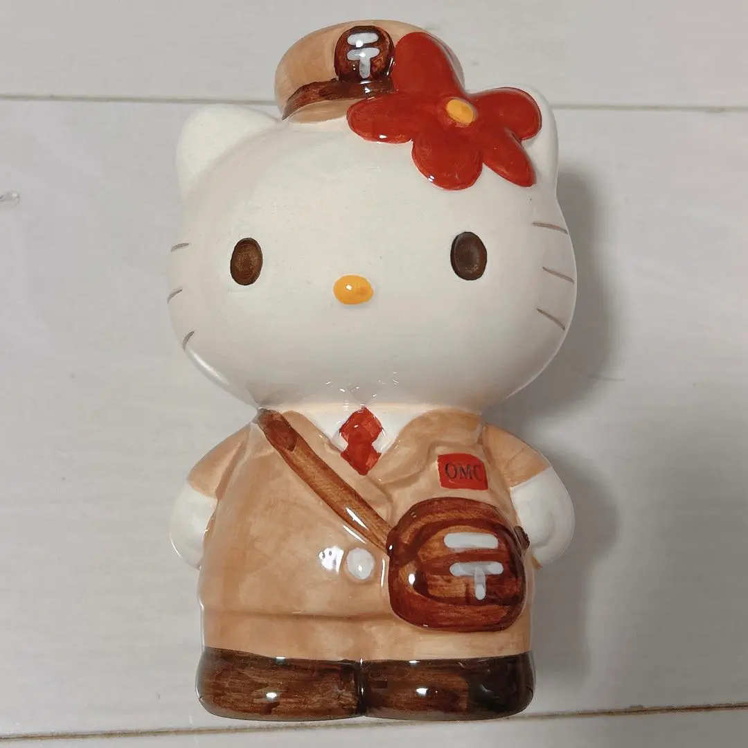 郵便局 OMCカードキティちゃん 配達員 貯金箱 陶器 レトロ 2025年最新】キティ貯金箱 omcの人気アイテム - メルカリ