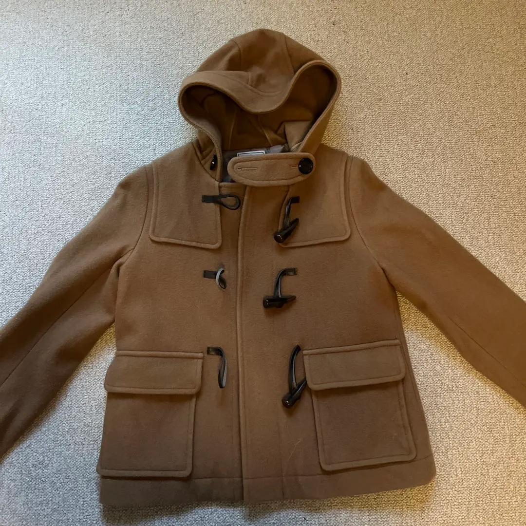 女士 棕色外套 牛角扣大衣 的縮圖