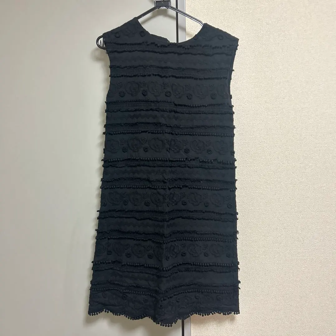 Thumbnail of Black sleeveless knee-length dress