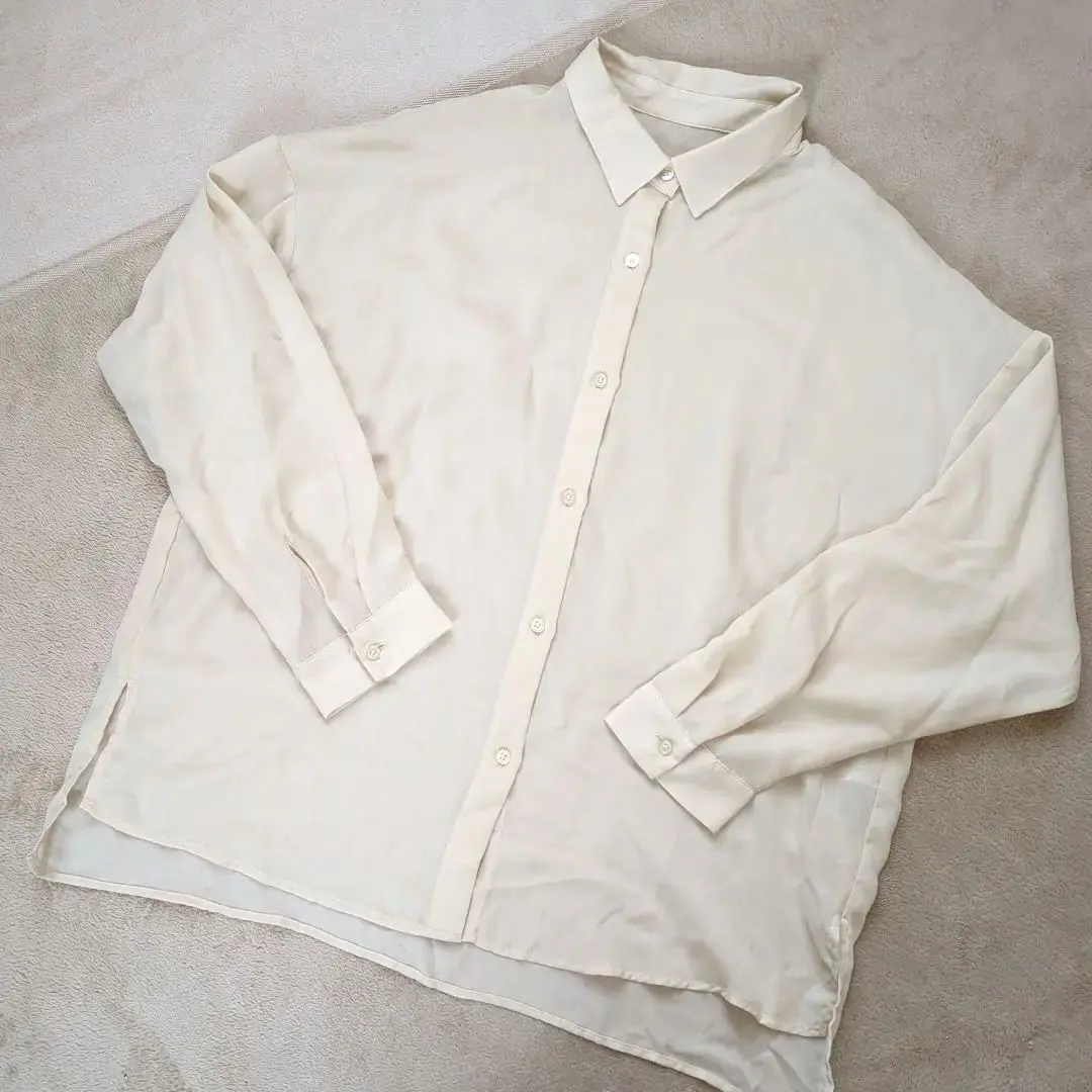 Thumbnail of Price reduced: GU cream-colored oversized long-sleeved shirt