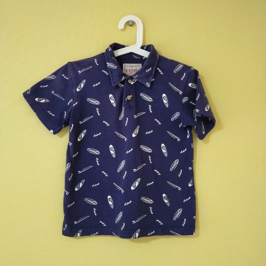 Thumbnail of Navy polo shirt, short sleeves, sports pattern