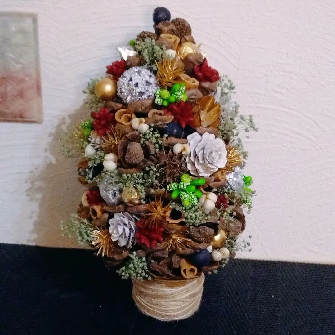 Thumbnail of Pinecone tree, dried flowers, and nuts