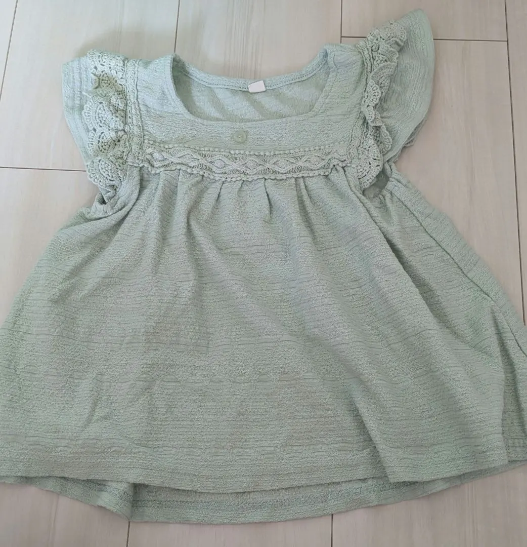 Thumbnail of Light green top with lace and frill sleeves