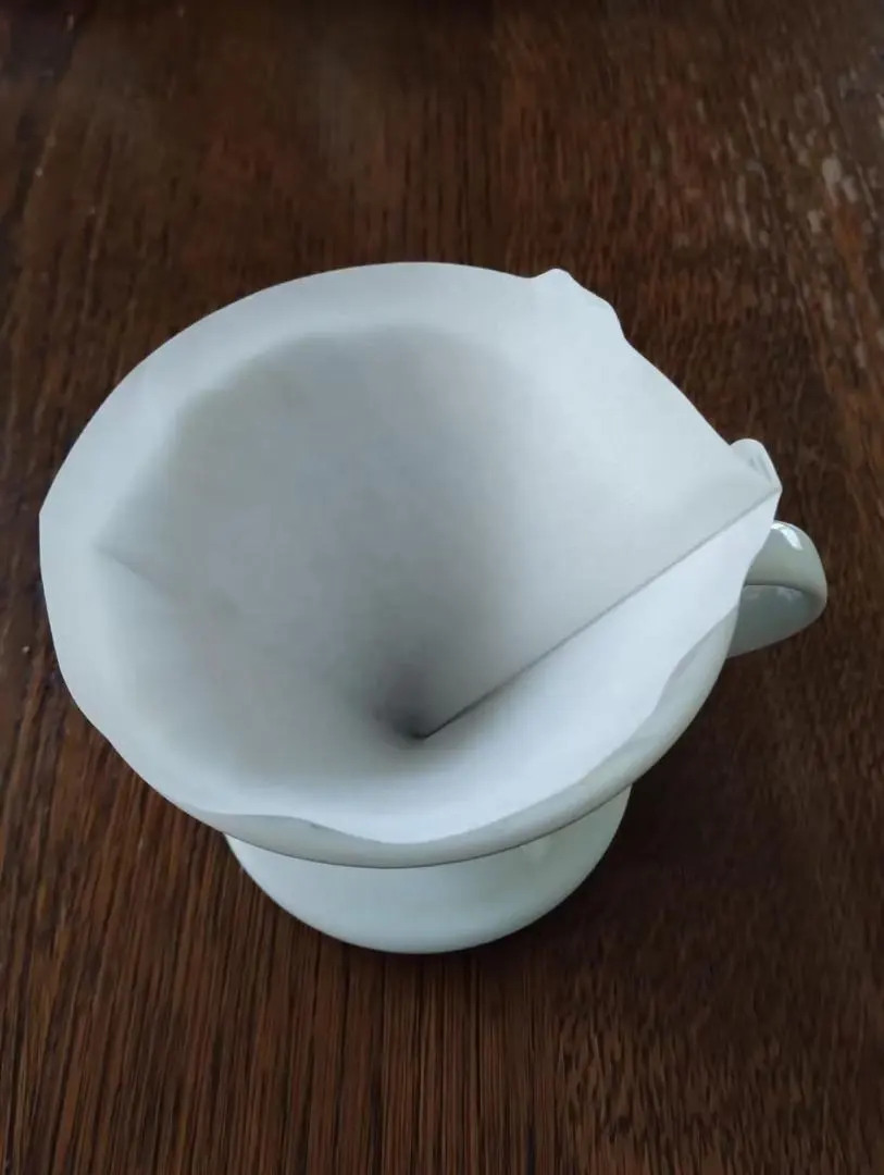 Thumbnail of White ceramic dripper, approximately 8cm
