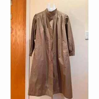 Thumbnail of Beige long-sleeved button-down dress