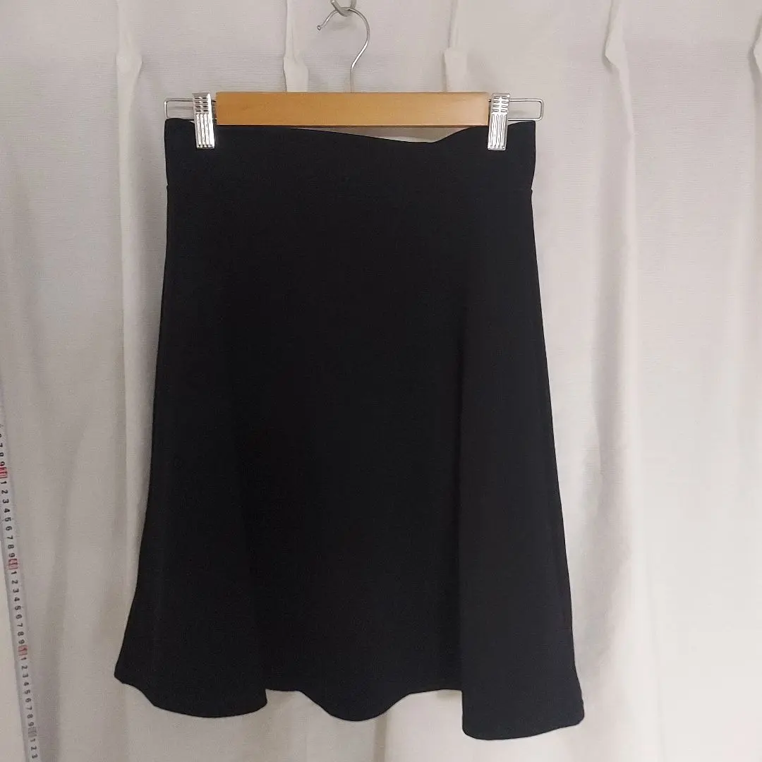Thumbnail of Black flared skirt, back zipper, elastic waist sides, GU, with lining