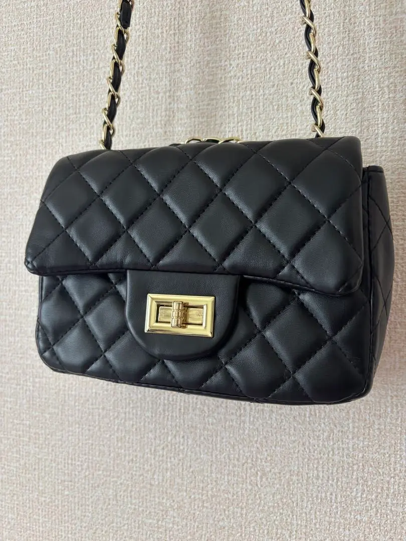 Thumbnail of Quilted black shoulder bag