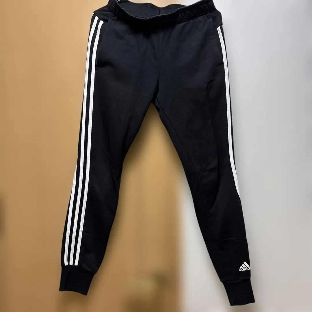 Thumbnail of Adidas black jersey pants