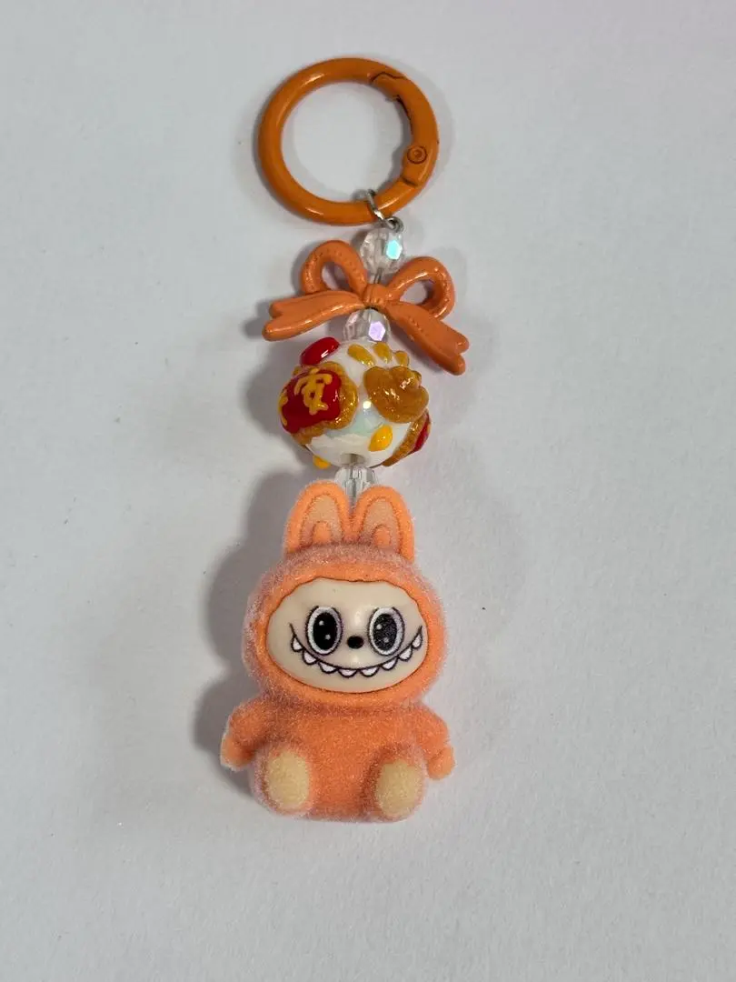 Thumbnail of Labubu Character Keychains - Orange. Bulk purchases welcome.