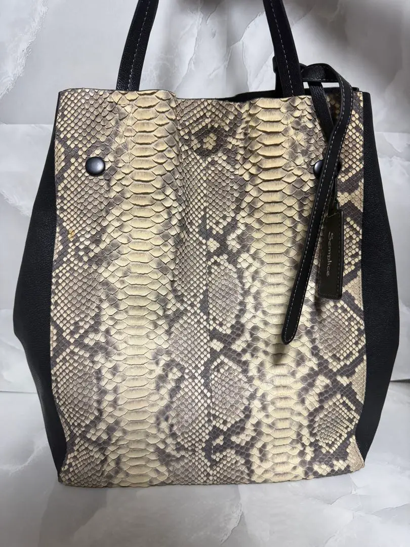 Thumbnail of Snake-skin handbag