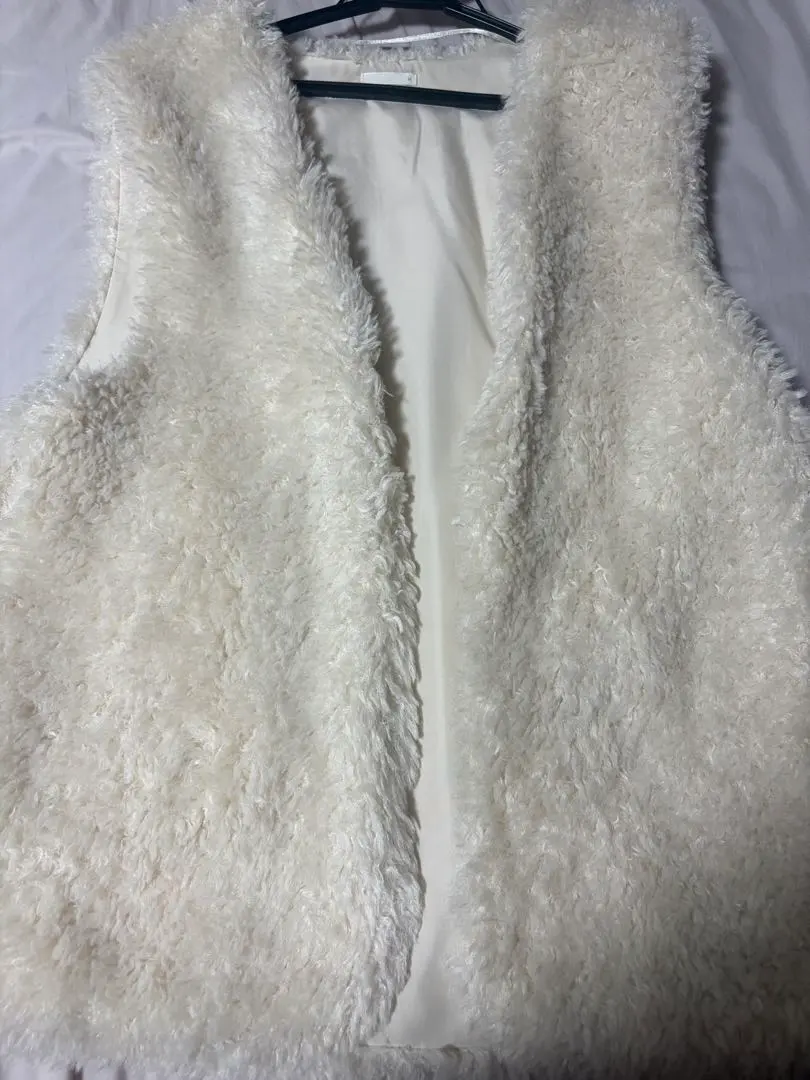 Thumbnail of White faux fur sleeveless vest