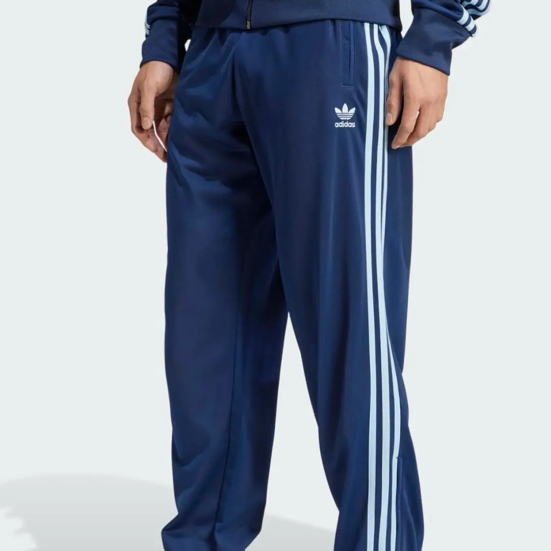 Thumbnail of Adidas track pants, blue