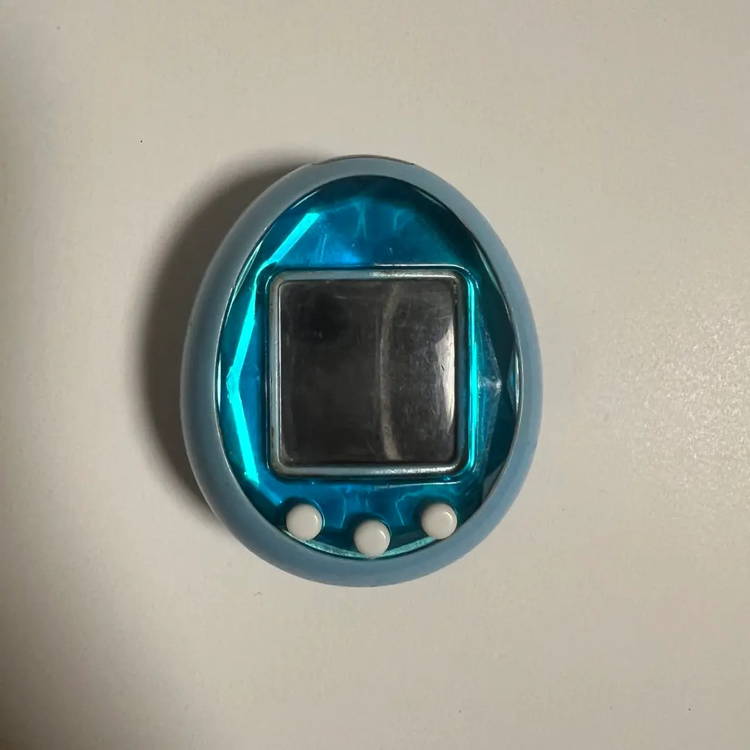 Thumbnail of Tamagotchi id Blue. Tested and working.