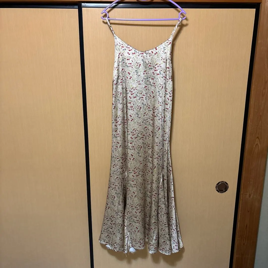 Thumbnail of It's a long camisole dress.