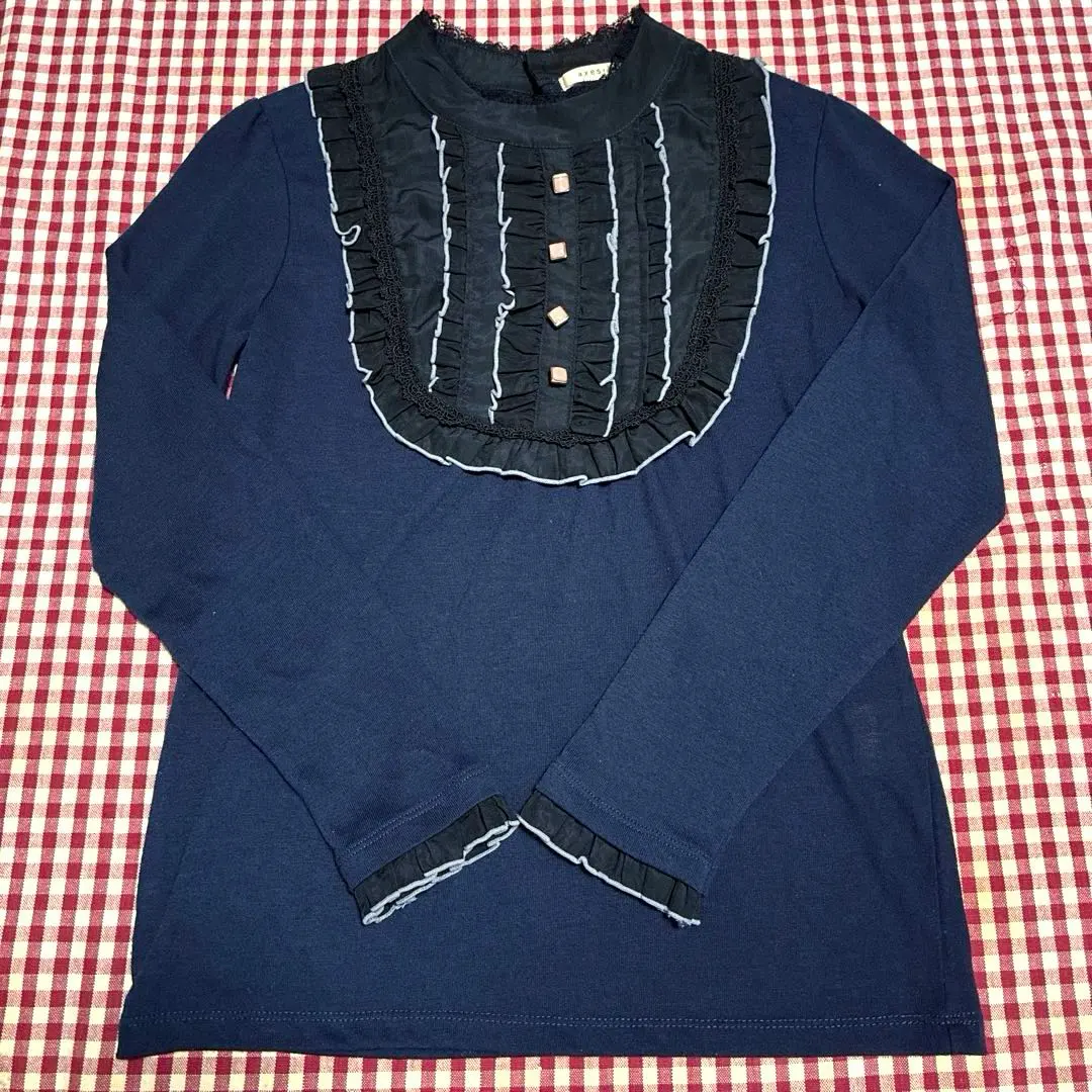 Thumbnail of Excellent condition axes femme navy top with frills, cut and sew