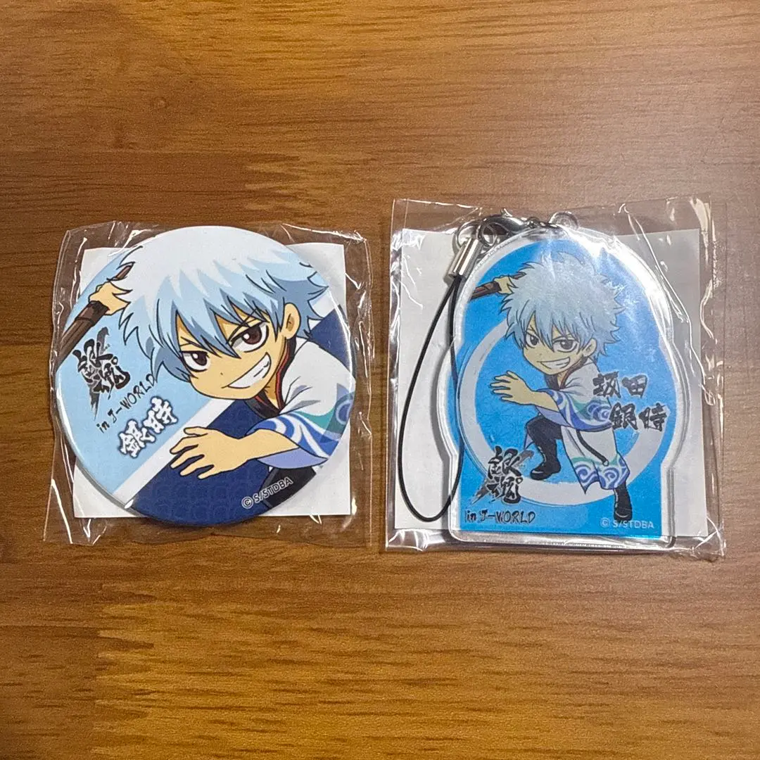 Thumbnail of Gintama J-World can badge and acrylic strap featuring Sakata Gintoki. J-World.