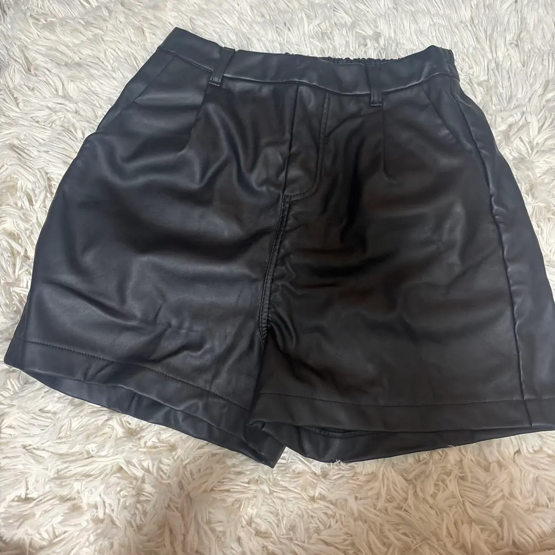 Thumbnail of Black shorts, size M