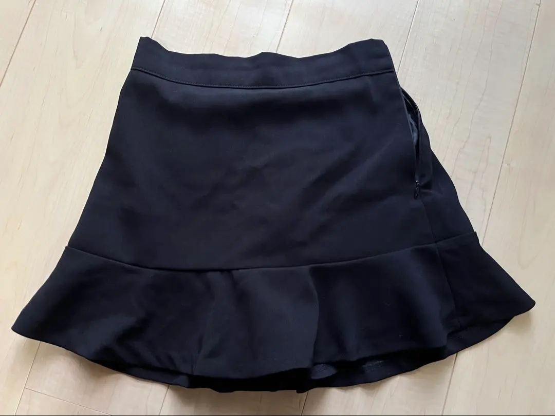 Thumbnail of Black flared skirt, simple, mini length, beautiful condition