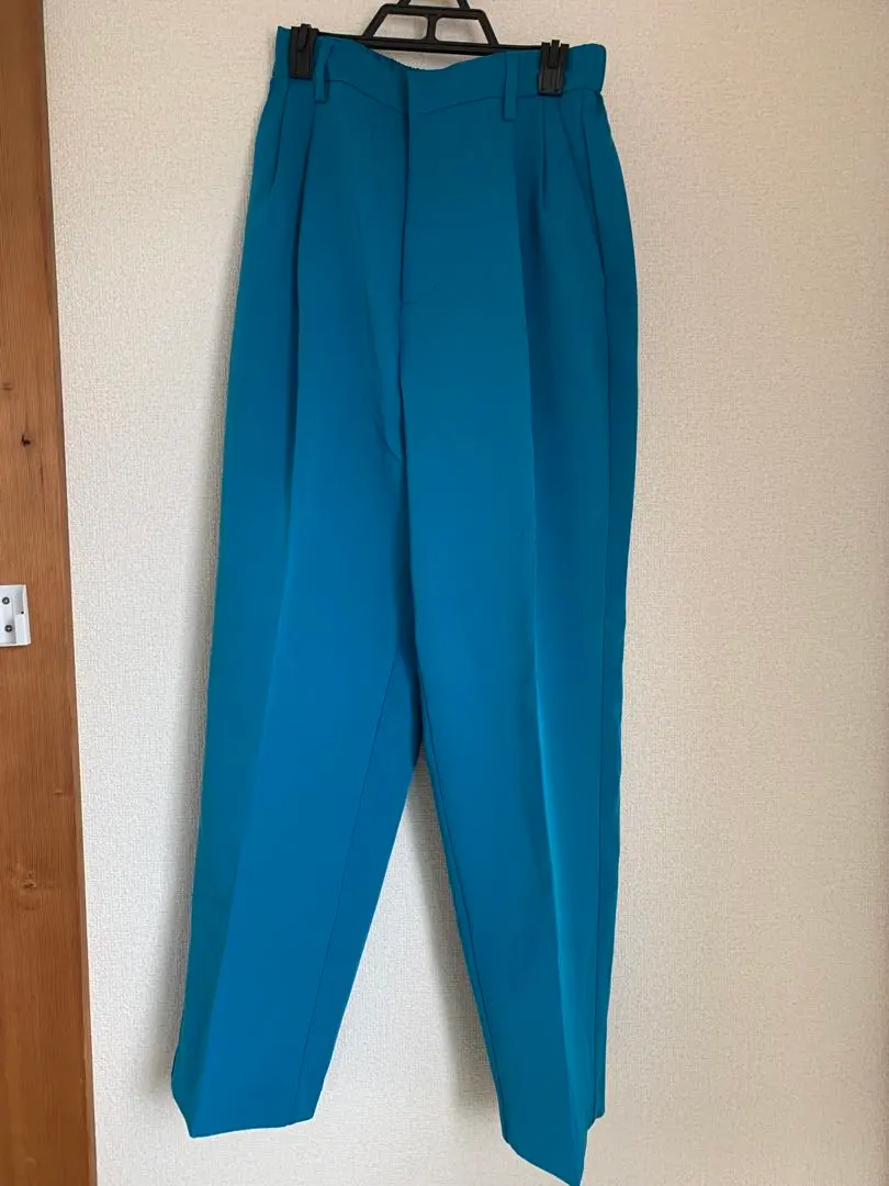 Thumbnail of Blue tapered pants with an elastic waist
