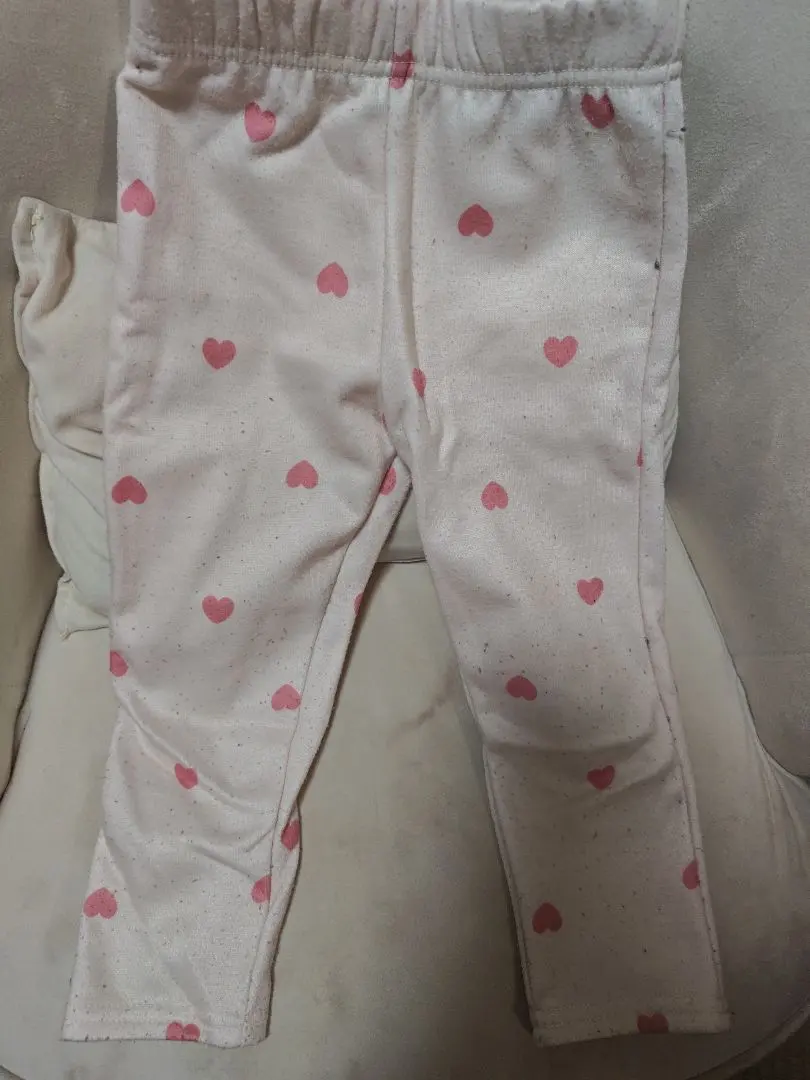 Thumbnail of White pants with a heart pattern