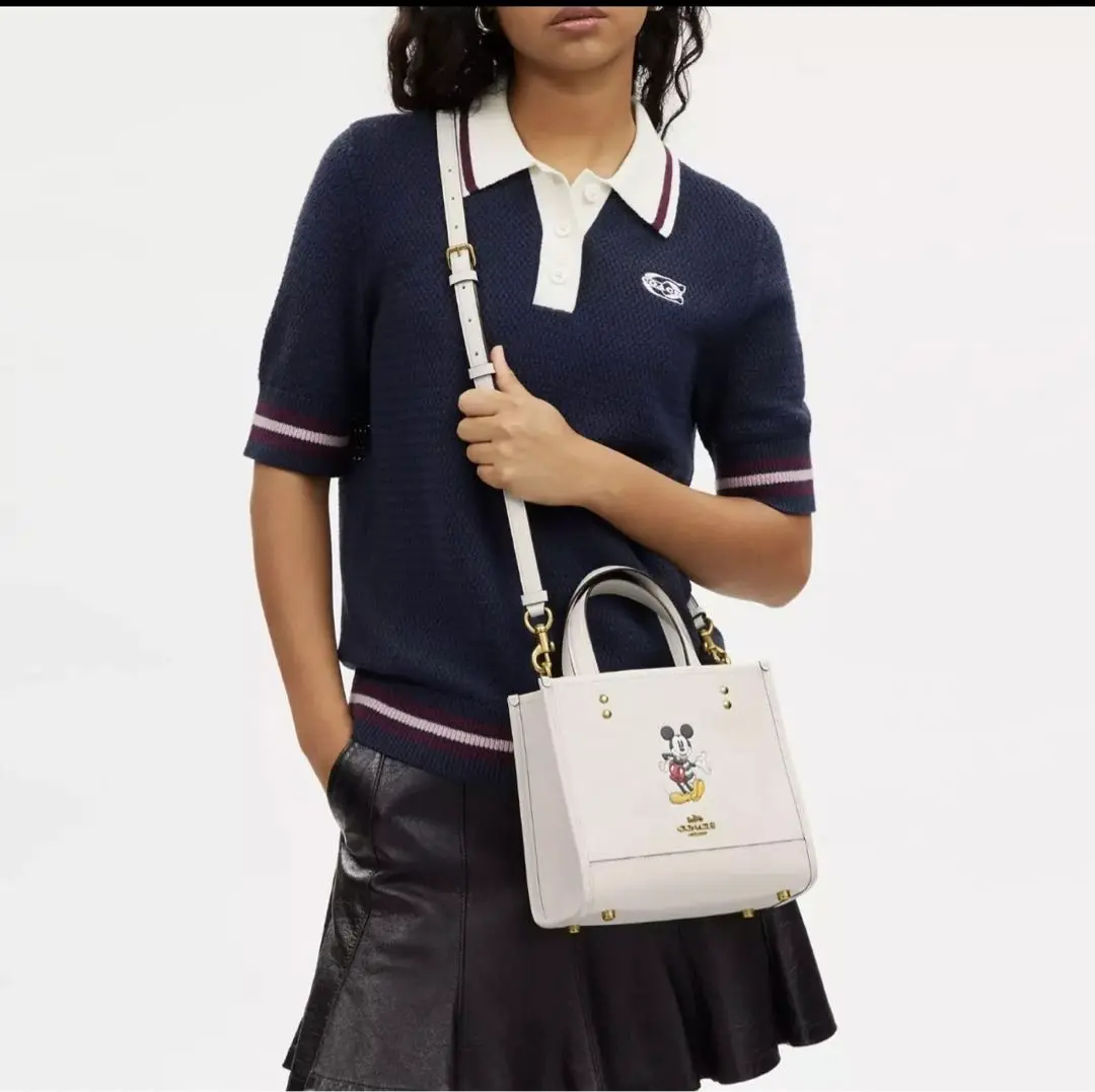 2025年最新】coachディズニー100周年の人気アイテム - メルカリ