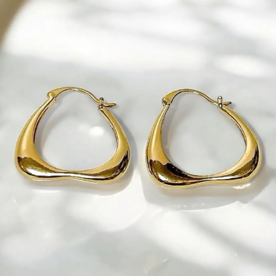 Thumbnail of Gold hoop earrings