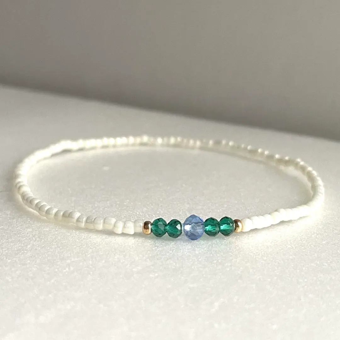 Thumbnail of Glass bead bracelet: Pearl White, Cut Green, Cut Blue, Gold