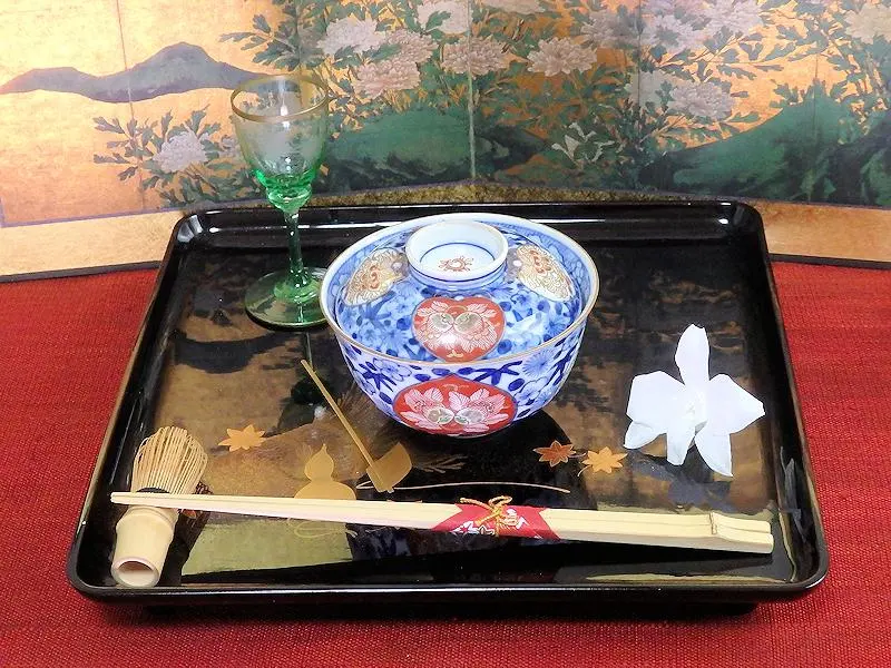 Thumbnail of Daishoji Imari, somen nishiki (dyed brocade), window design, pine, bamboo, plum, and flower motif, small lidded tea bowl, N955AS-fbum