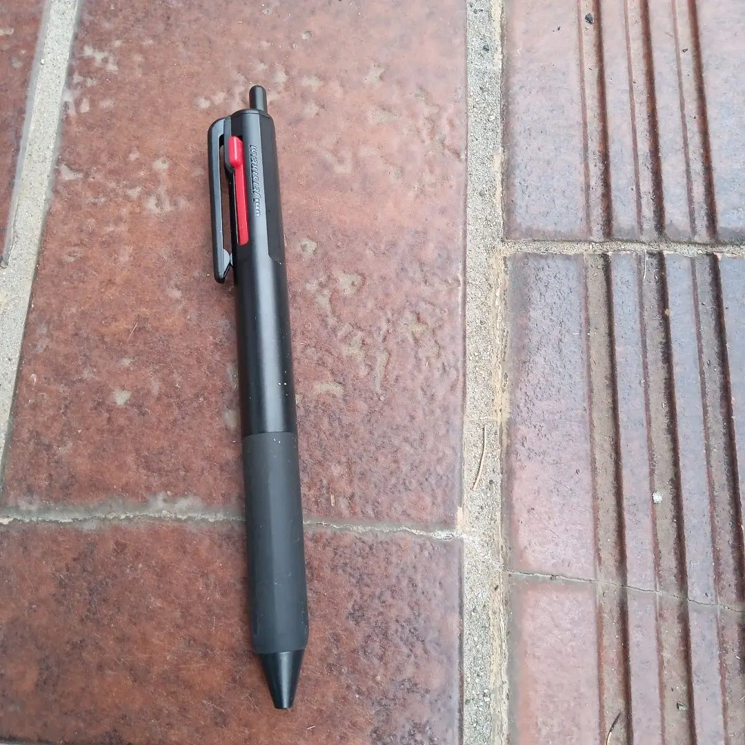 Thumbnail of Black ballpoint pen with rubber grip