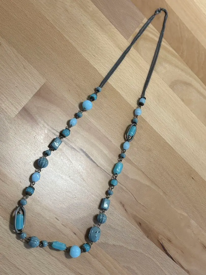 Thumbnail of Long necklace with blue beads and metal