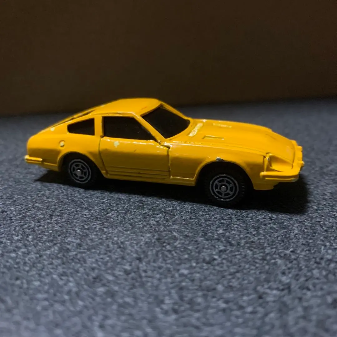 Thumbnail of Yellow sports car miniature car