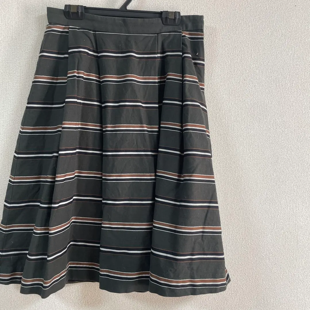 Thumbnail of Black striped pleated skirt, knee-length
