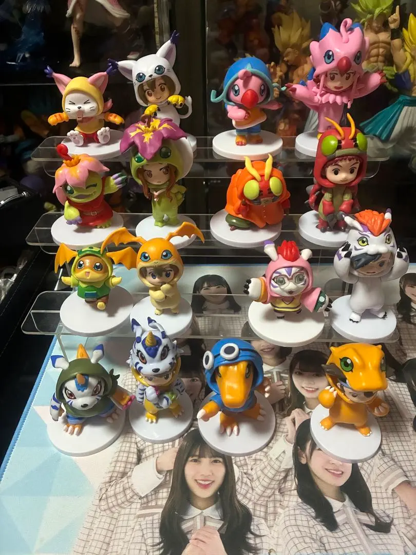 Thumbnail of 16 Digimon figures with figure stands