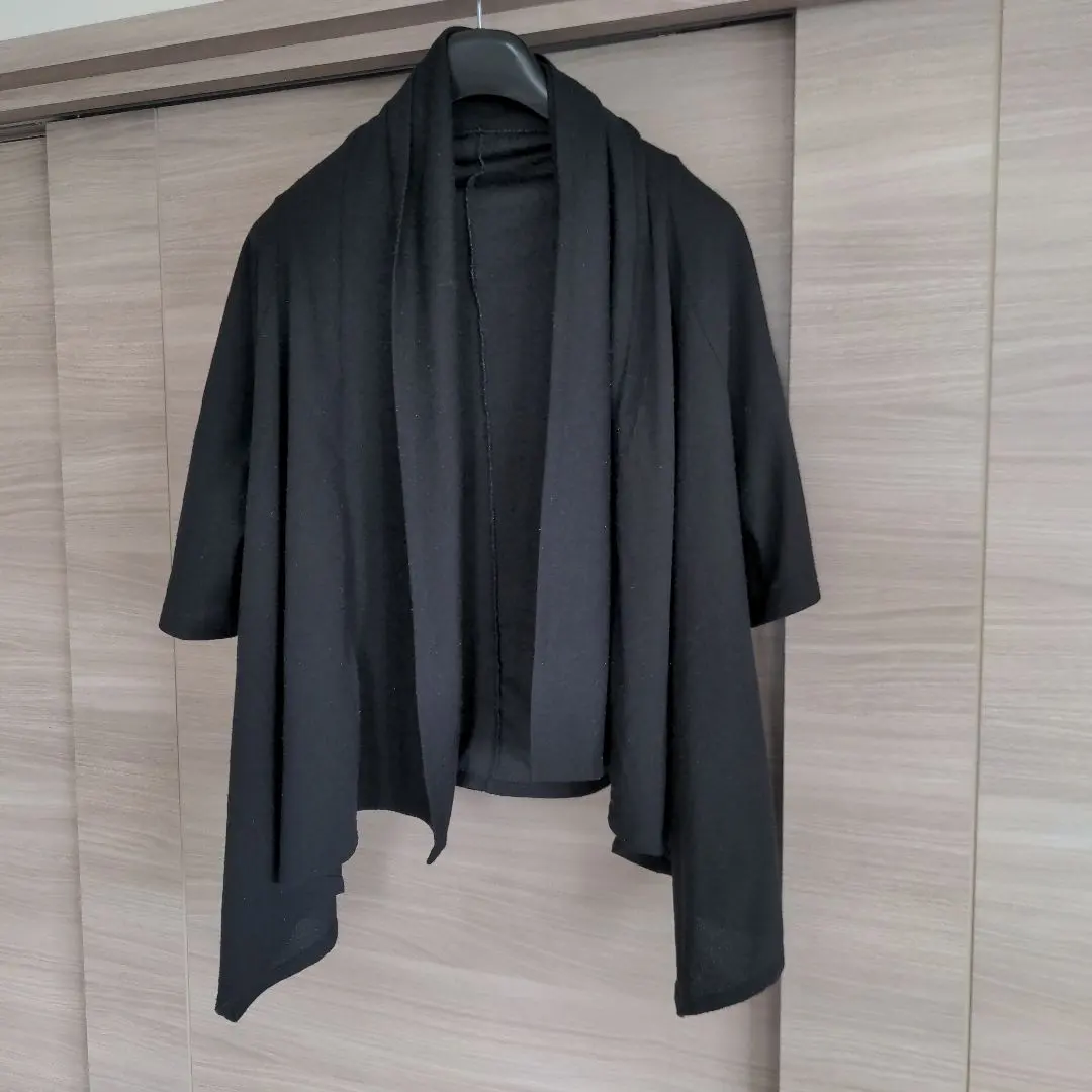 Thumbnail of Black garden roll-up