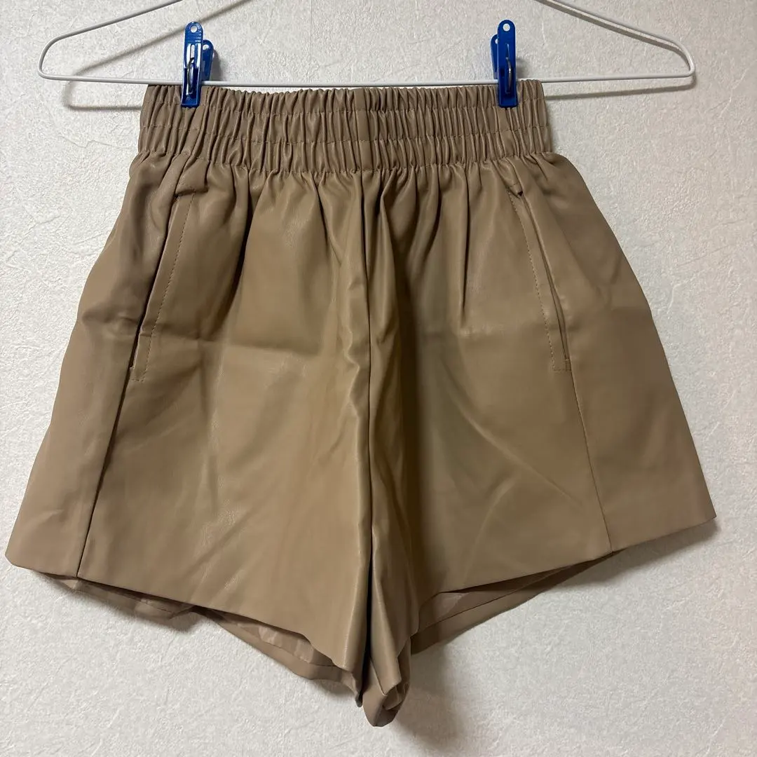 Thumbnail of Beige faux leather shorts