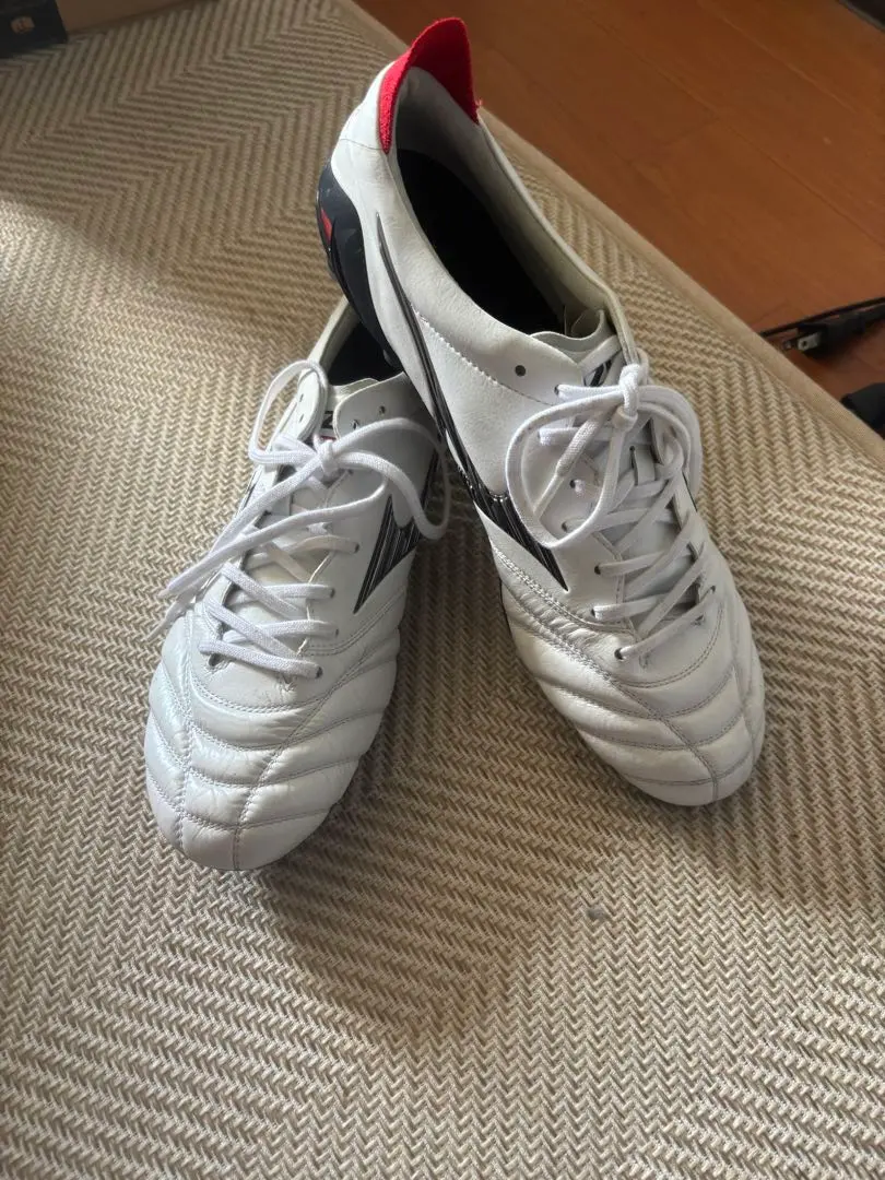 Thumbnail of White leather soccer cleats