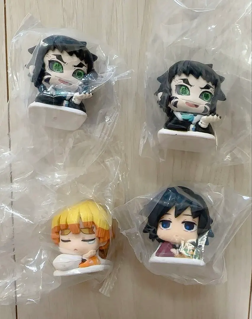 Thumbnail of Kimetsu no Yaiba Onemutan Volume 12: Giyu Tomioka, Zenitsu Agatsuma, and Kaigaku - set of 4